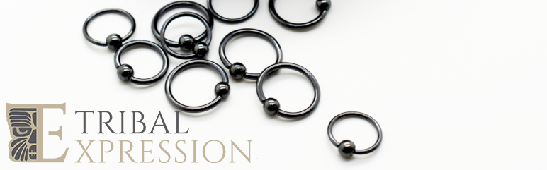 Black niobium captive bead rings with Tribal Expression branding