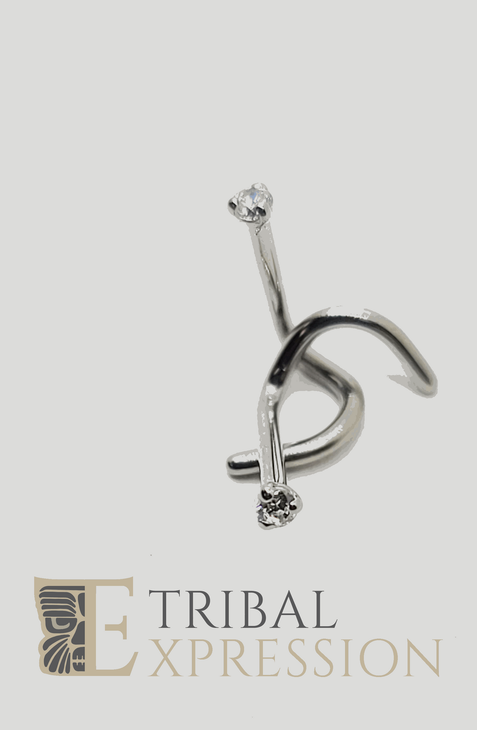 Titanium nostril jewelry with a clear three-prong gemstone setting