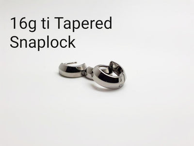 Polished tapered titanium clickers labelled 16g