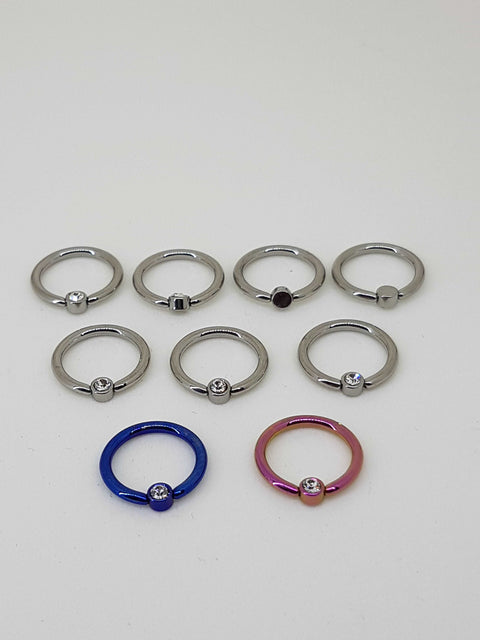 High polised and anodized titanium captive bead rings with gemmed captive beads
