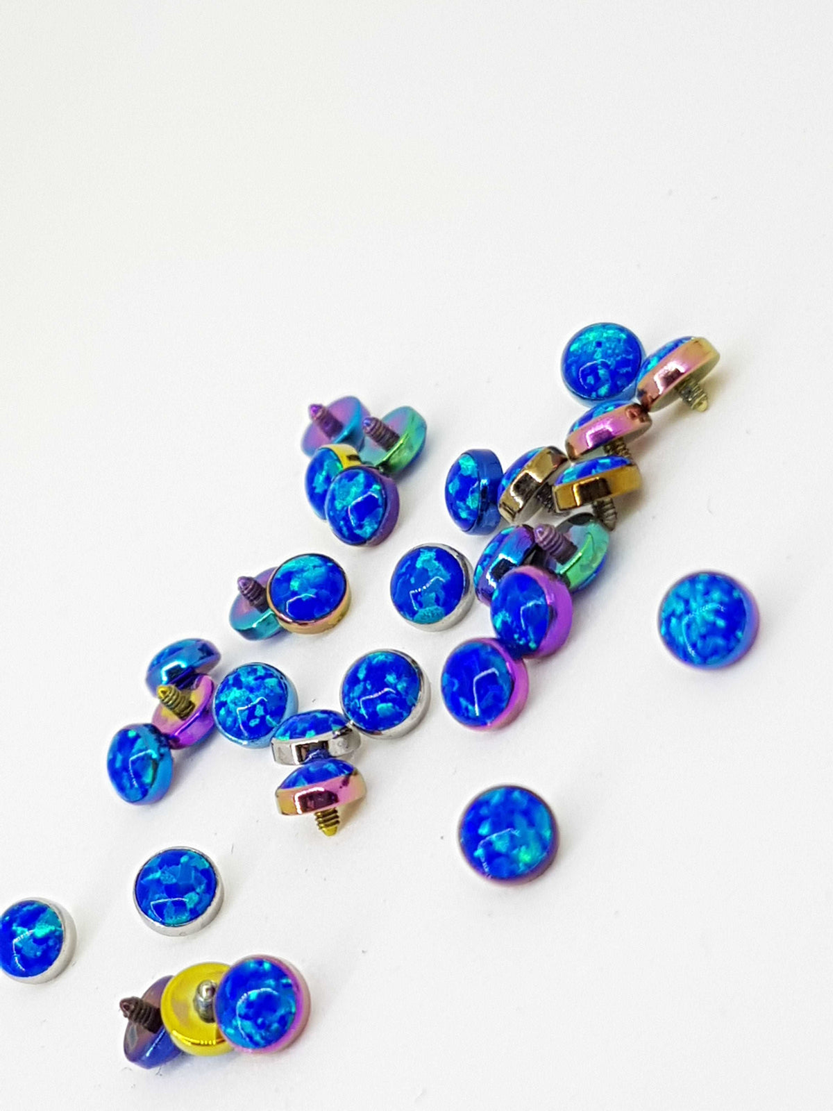 Deep blue opal-look jewelry ends in anodized titanium settings