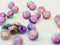 Pink threaded synthetic opals 