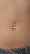 Freshly pierced navel with our implant grade titanium Curved barbell with a pear shaped clear cubic zirconia in the center