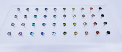 Titanium threadless gemstone ends arranged in a multicoloured grid