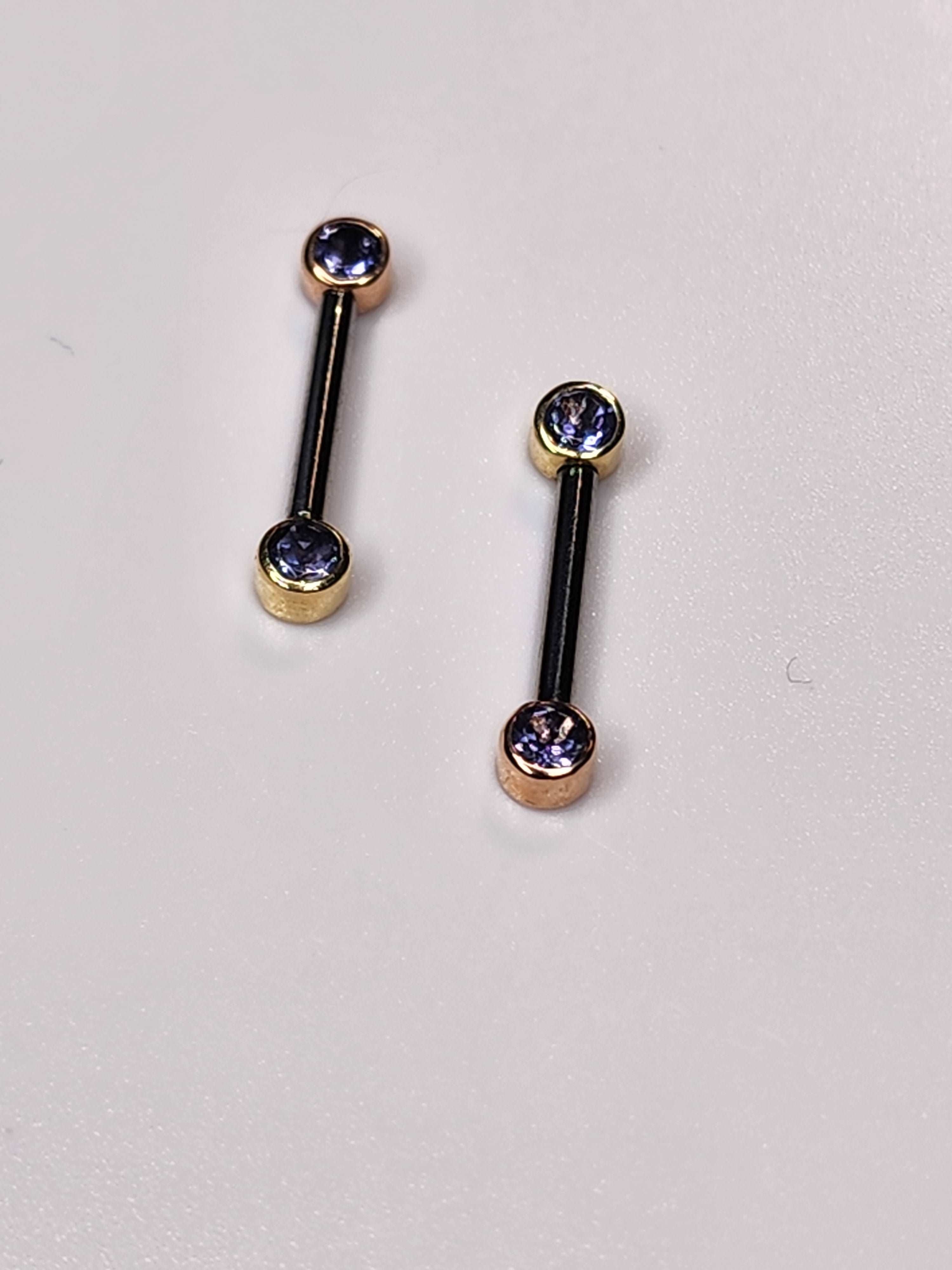 solid 14kt yellow and rose gold threadless side facing tops with genuine iolite stones in a bezel setting