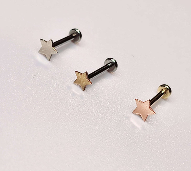 solid 14kt yellow, rose and white gold threadless curved star shapes on a threadless labret