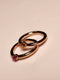 solid 14kt Rose gold seam rings addorned with red and yellow genuine sapphires in a prong setting