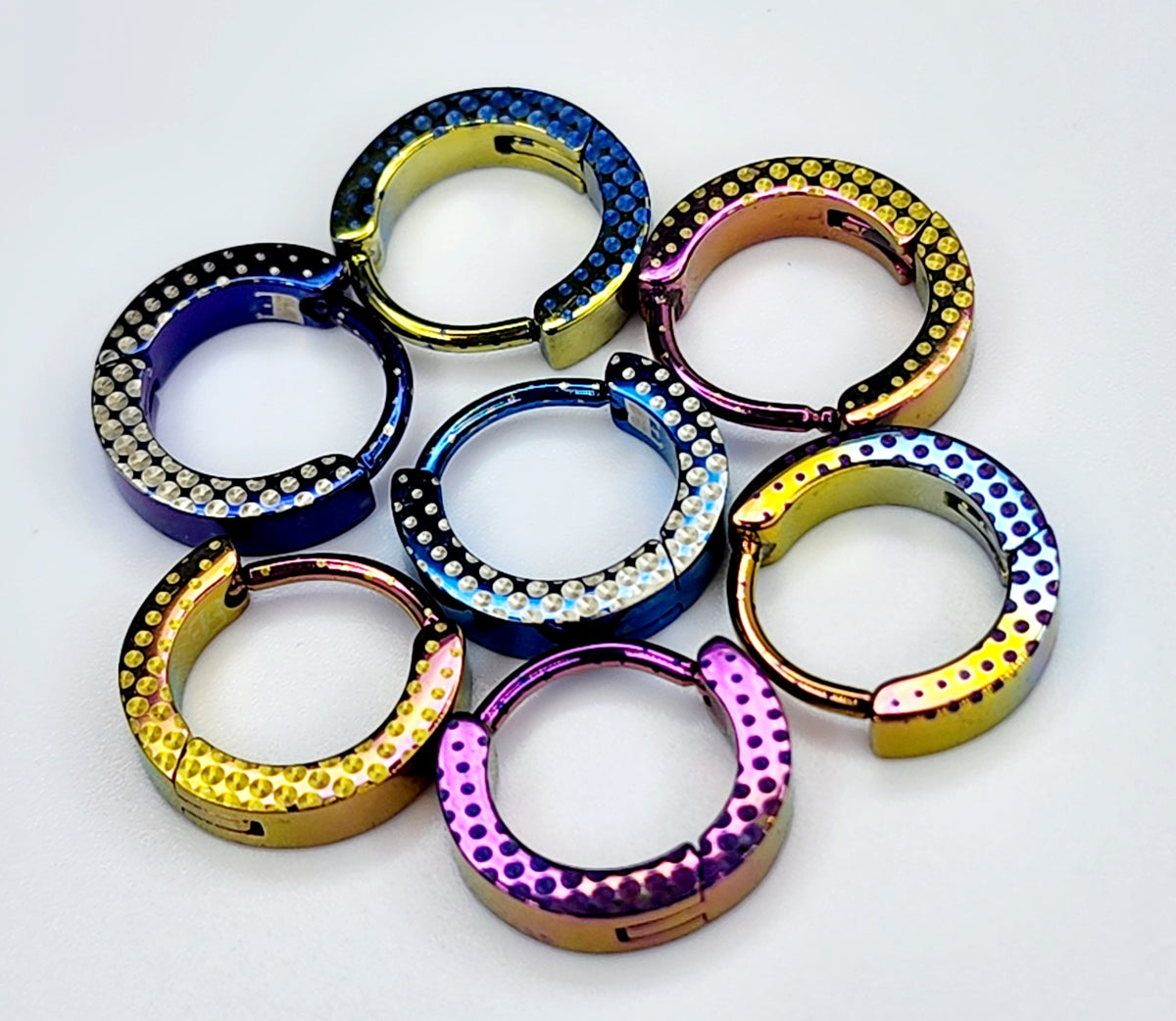 The Fade titanium clickers with dotted patterns in assorted colours