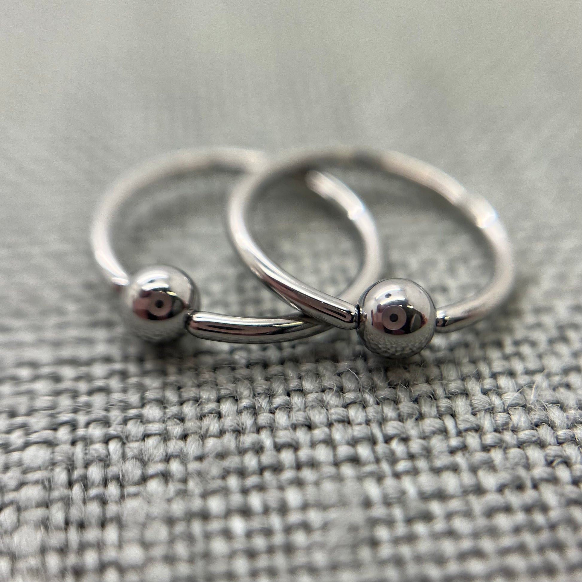 Pair, 18g Stainless Steel Captive Bead Rings. Perfect polish. Clearance Tribal Expression Jewelry