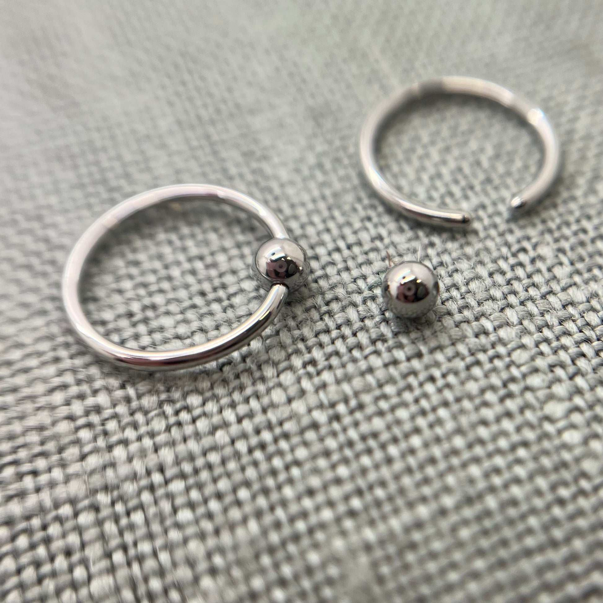 Pair, 18g Stainless Steel Captive Bead Rings. Perfect polish. Clearance Tribal Expression Jewelry