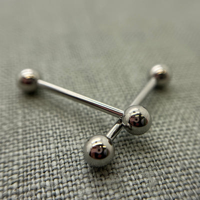 Crossed stainless steel straight barbells with round beads