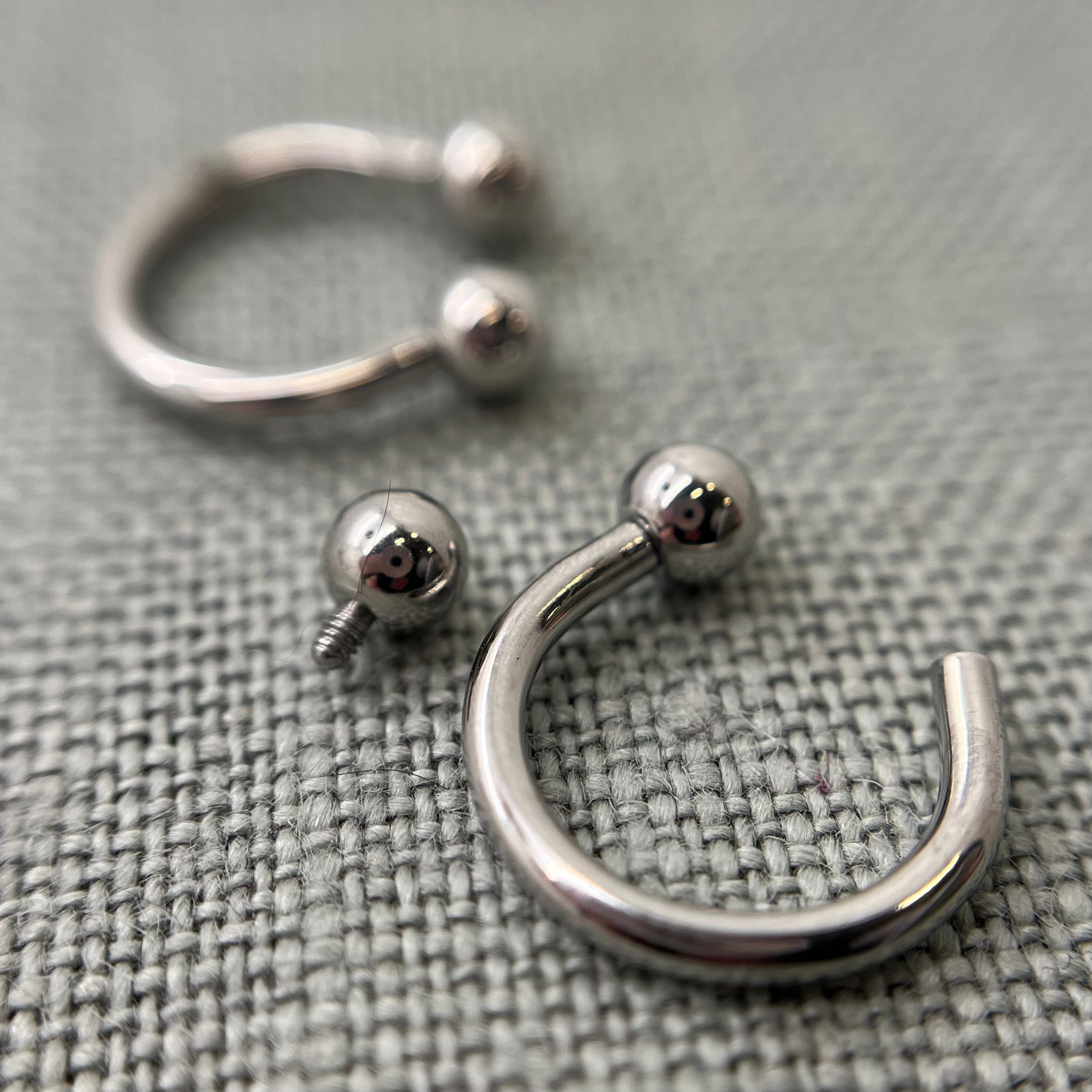 Stainless steel circular barbells with threaded beads removed