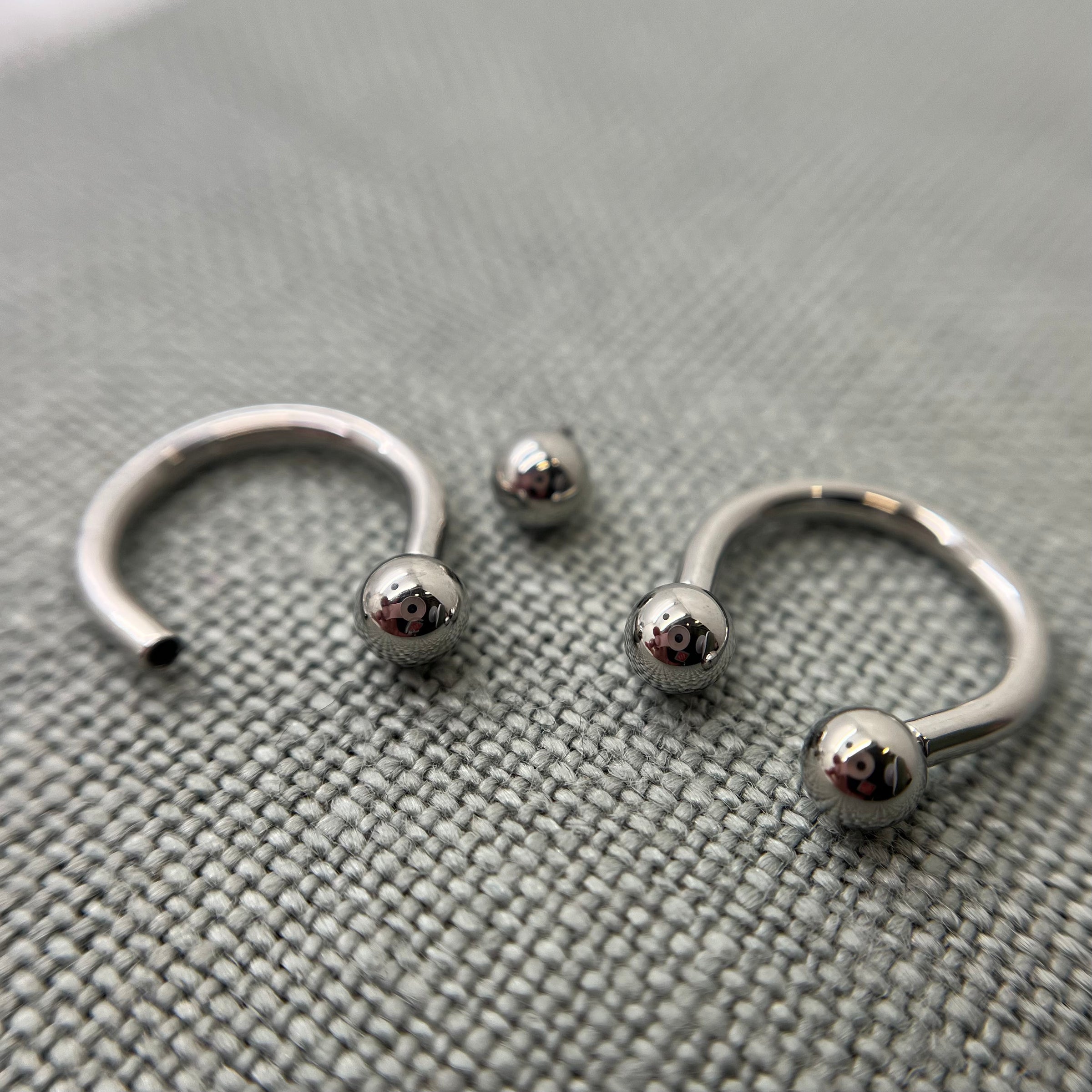 Stainless steel circular barbells with threaded beads removed