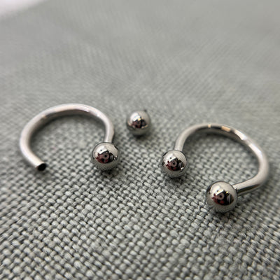 Stainless steel circular barbells with threaded beads removed