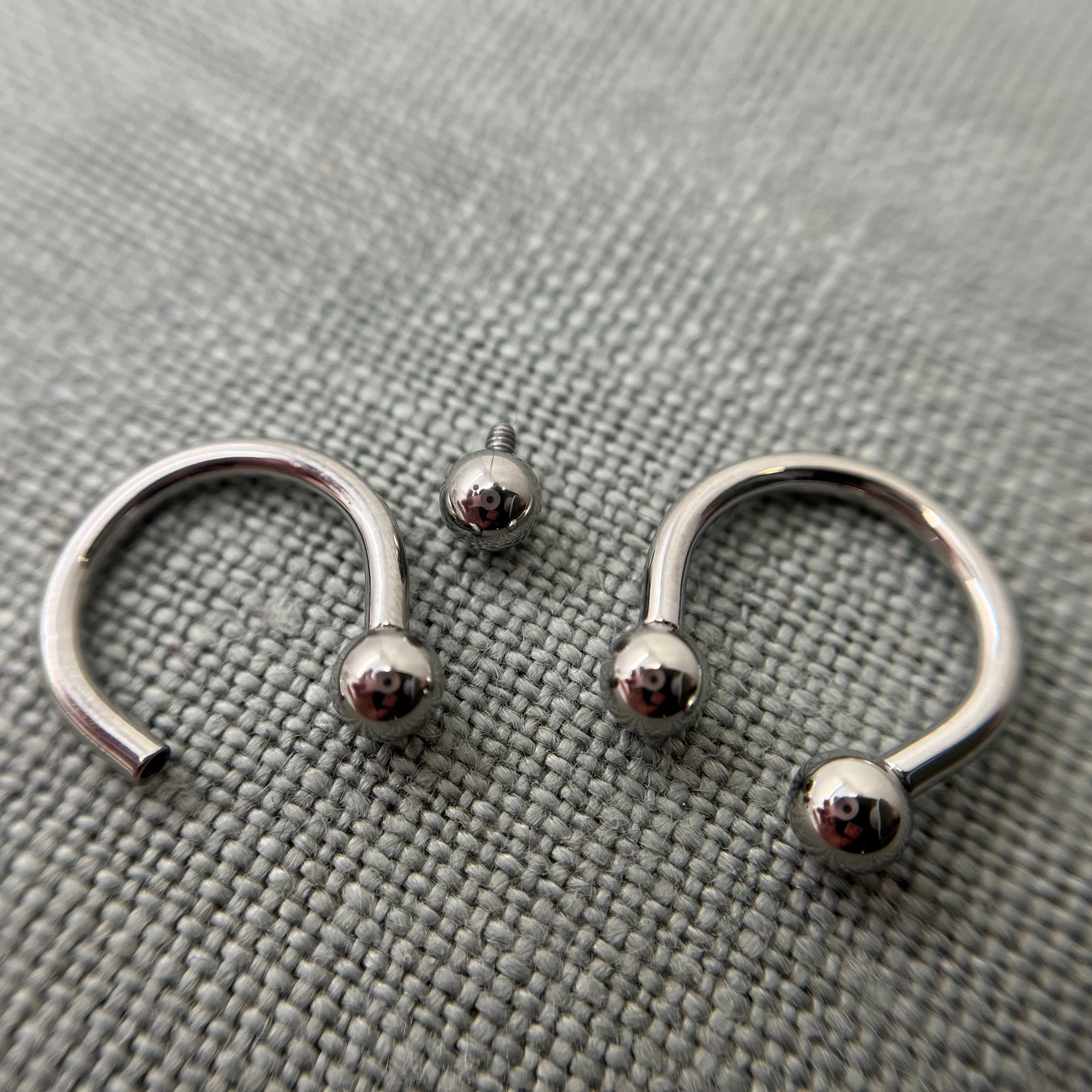 Stainless steel circular barbells with threaded beads removed