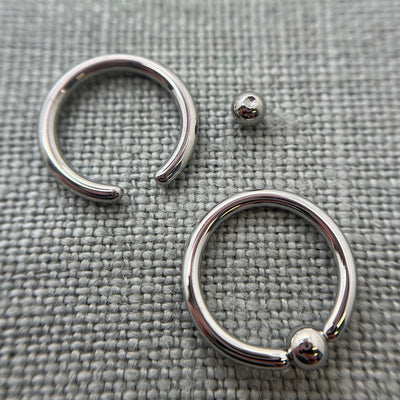 Stainless steel captive bead rings with a bead removed