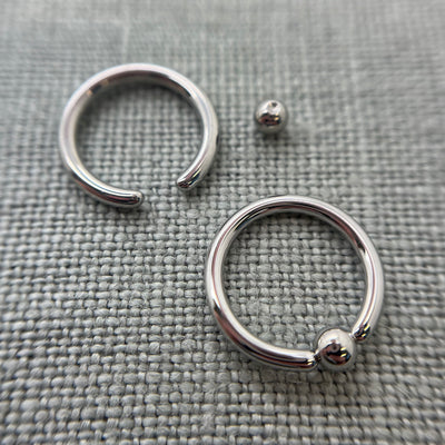 Stainless steel captive bead rings with a bead removed