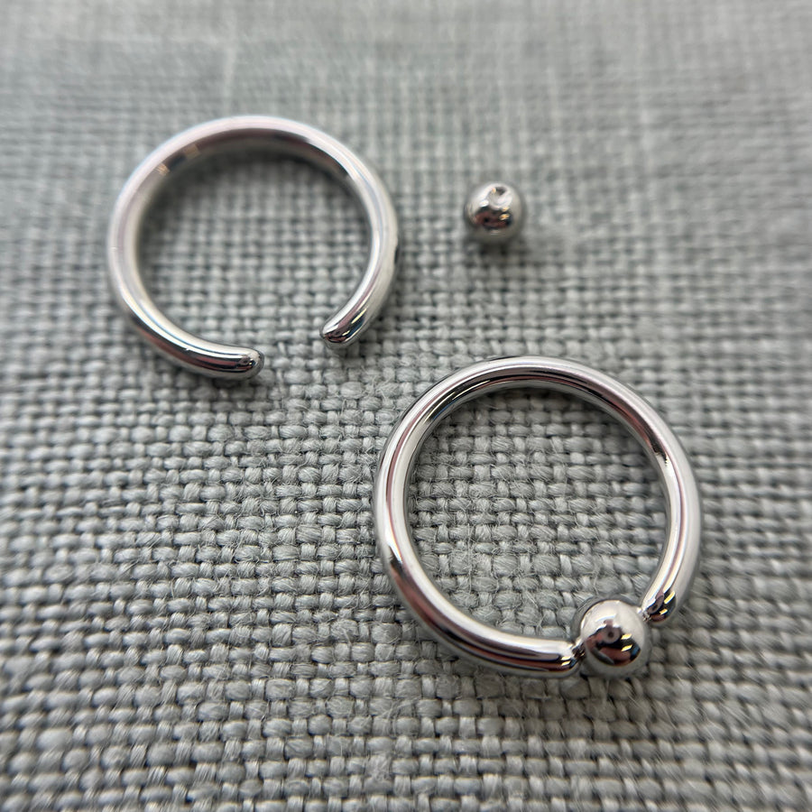 Stainless steel captive bead rings with a bead removed