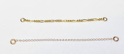 Two gold curation chains with attachment loops