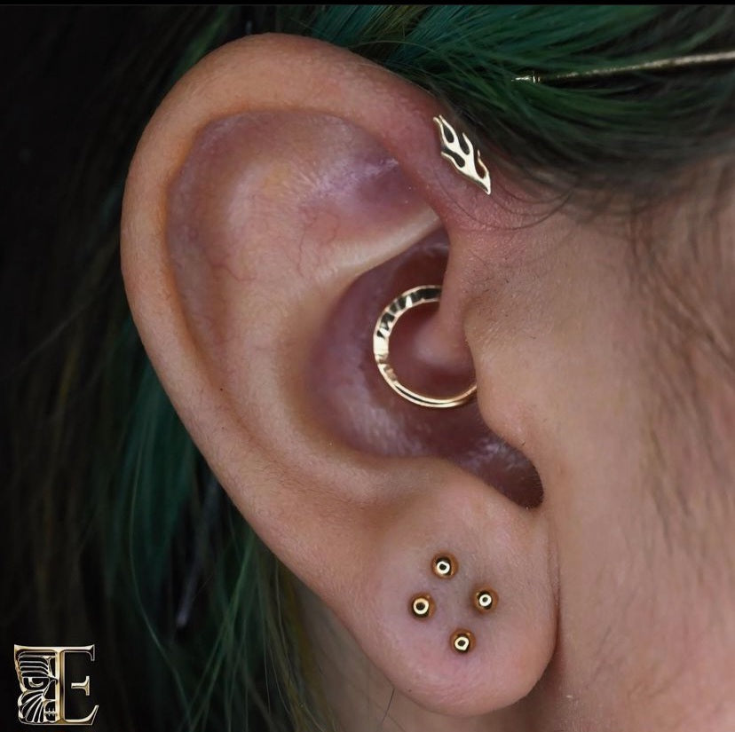 Solid 14kt yellow gold hammered seam perfectly placed in a daith