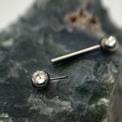 Clear gemstone threadless nipple jewelry end removed from its barbell