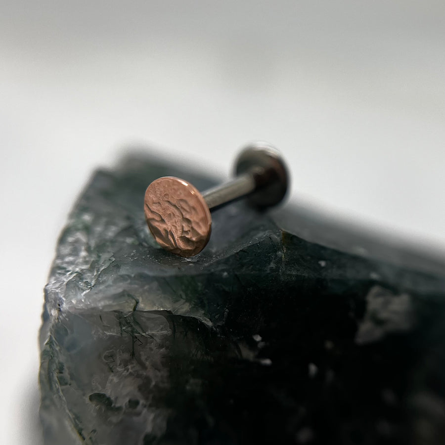 Textured rose gold disc end on a flat-back post