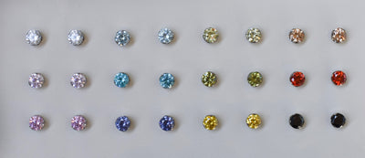 Titanium cubic zirconia ends arranged in rows of gemstone colours