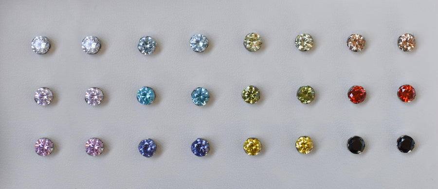 Titanium cubic zirconia ends arranged in rows of gemstone colours