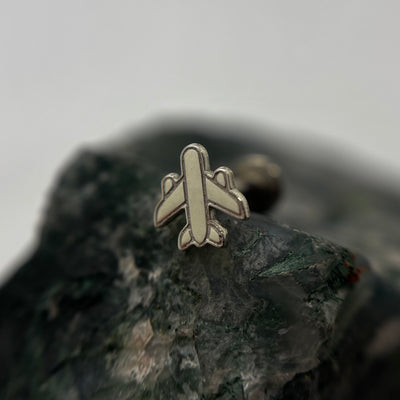 Silver airplane-shaped jewelry end on a flat-back post