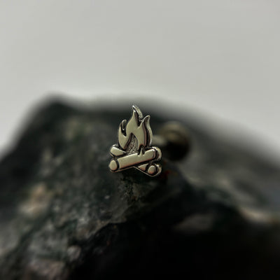 Silver campfire-shaped jewelry end with flame and log details