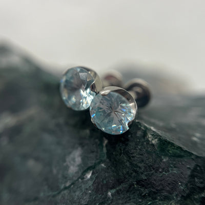 Pale blue cubic zirconia titanium ends on flat-back posts