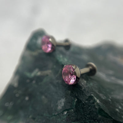 Pink cubic zirconia titanium ends on flat-back posts