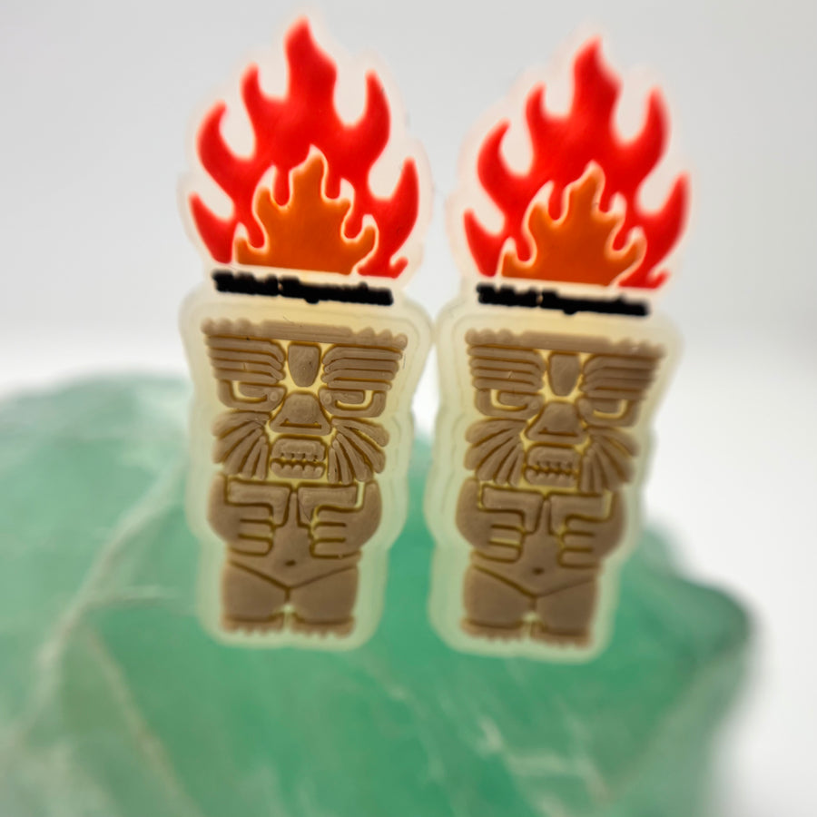 Pair of Tribal Expression flame and carved-face shoe charms
