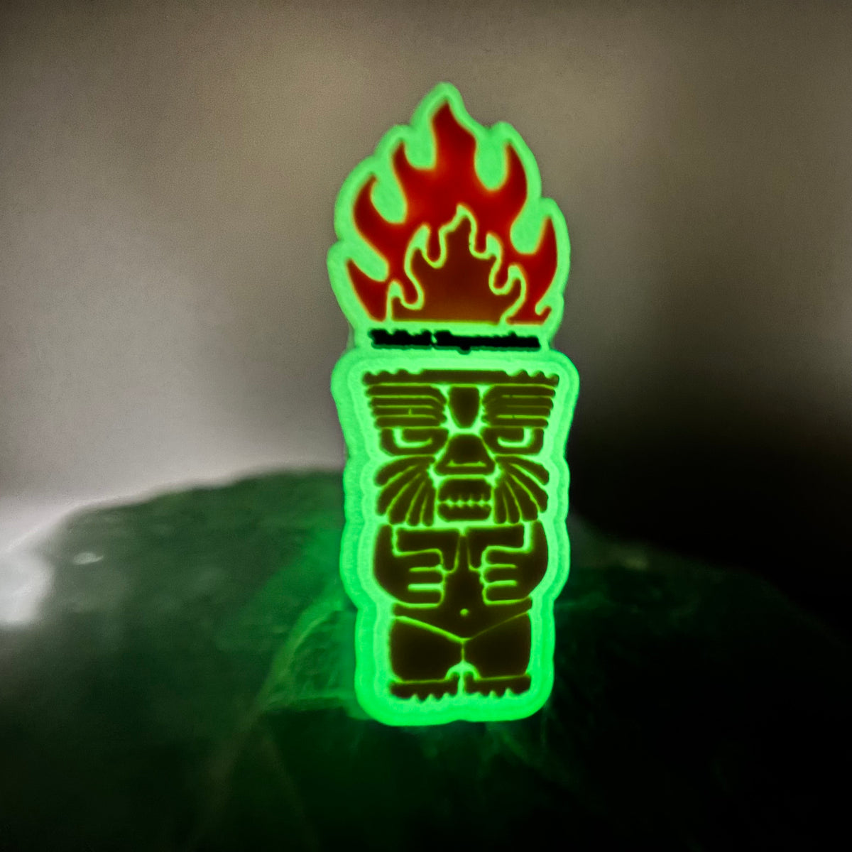 Tribal Expression shoe charm glowing green in the dark