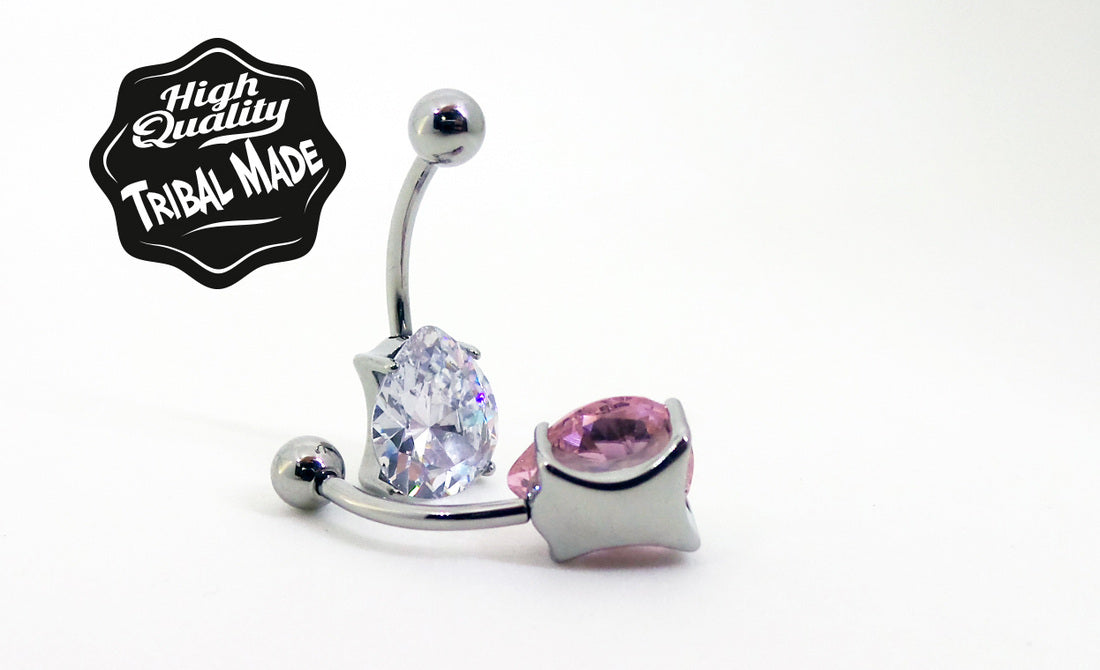 Titanium navel bars with clear and pink teardrop gemstones
