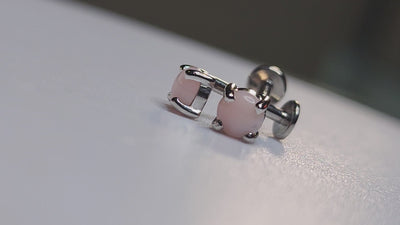 Pink opal jewelry ends in platinum settings on flat-back posts