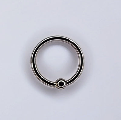 White gold fixed-bead seam ring