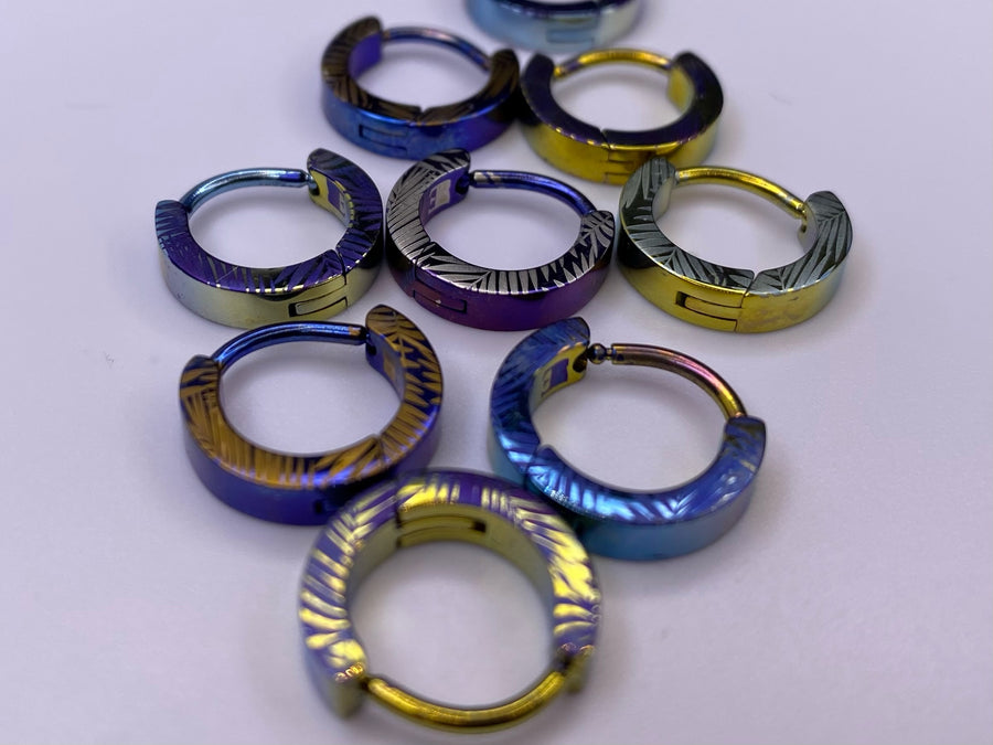 Palm Leaf titanium clickers in assorted anodized colours