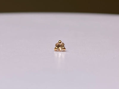 Rose-cut diamond jewelry end in a three-prong rose gold setting