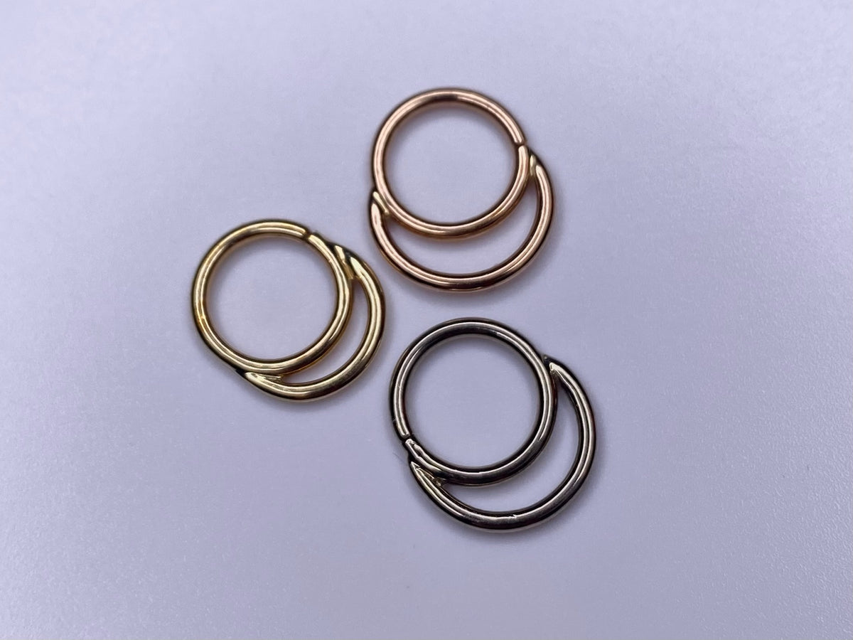 Stacked seam rings in yellow, rose and white gold