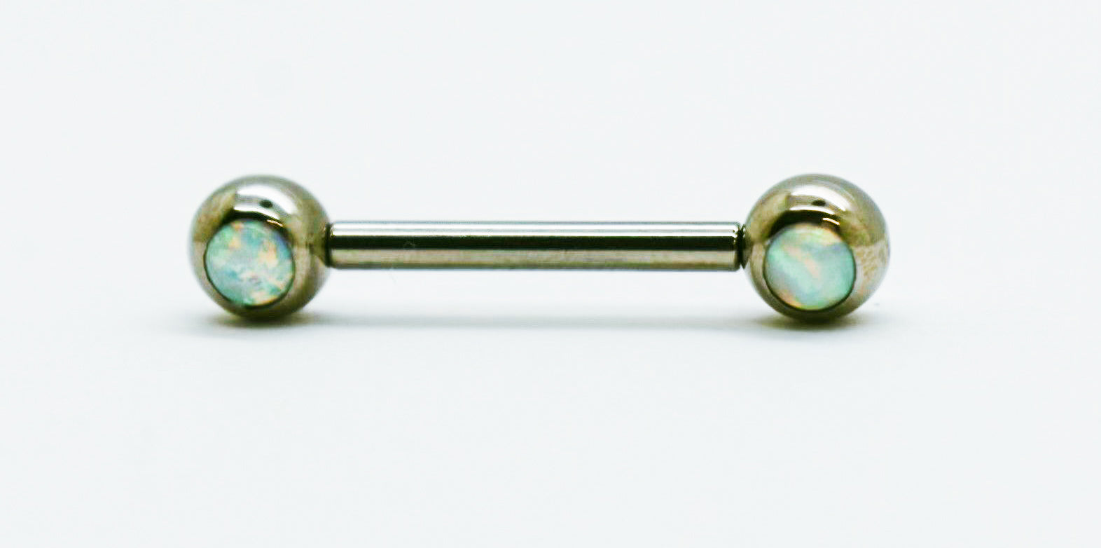 titanium threadless barbells with white synthetic opals