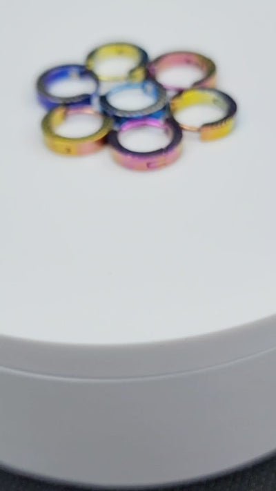 The Fade titanium clickers with dotted patterns in assorted colours