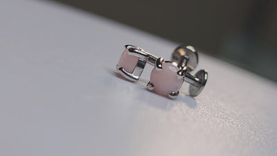 Pink opal jewelry ends in platinum settings on flat-back posts