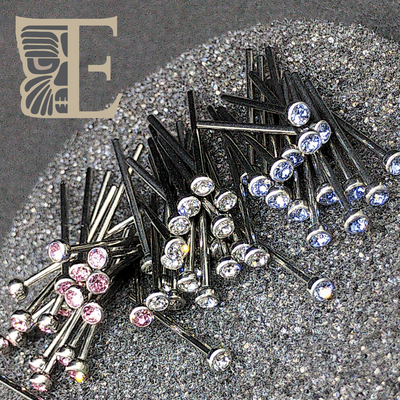 Clear, pink and blue gemstone titanium nostril studs