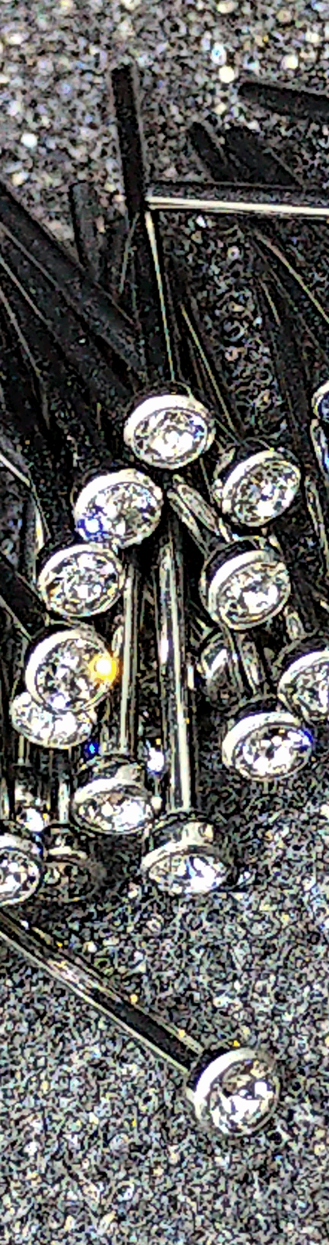 Clear cubic zirconia titanium nostril studs on a textured display