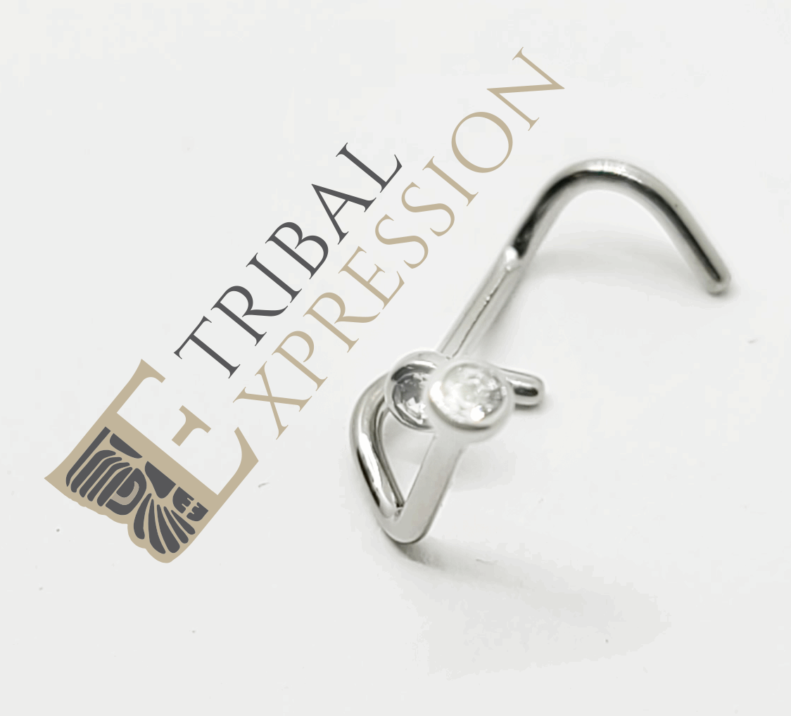 Bent titanium nostril screw with a clear bezel-set cubic zirconia
