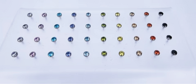 Titanium threadless gemstone ends arranged in a multicoloured grid