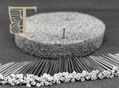 Rows of straight titanium nostril studs around a display stand