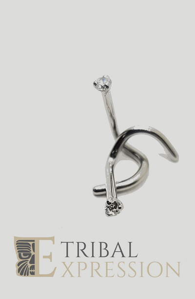 Bent titanium nostril screw with a clear three-prong gemstone setting