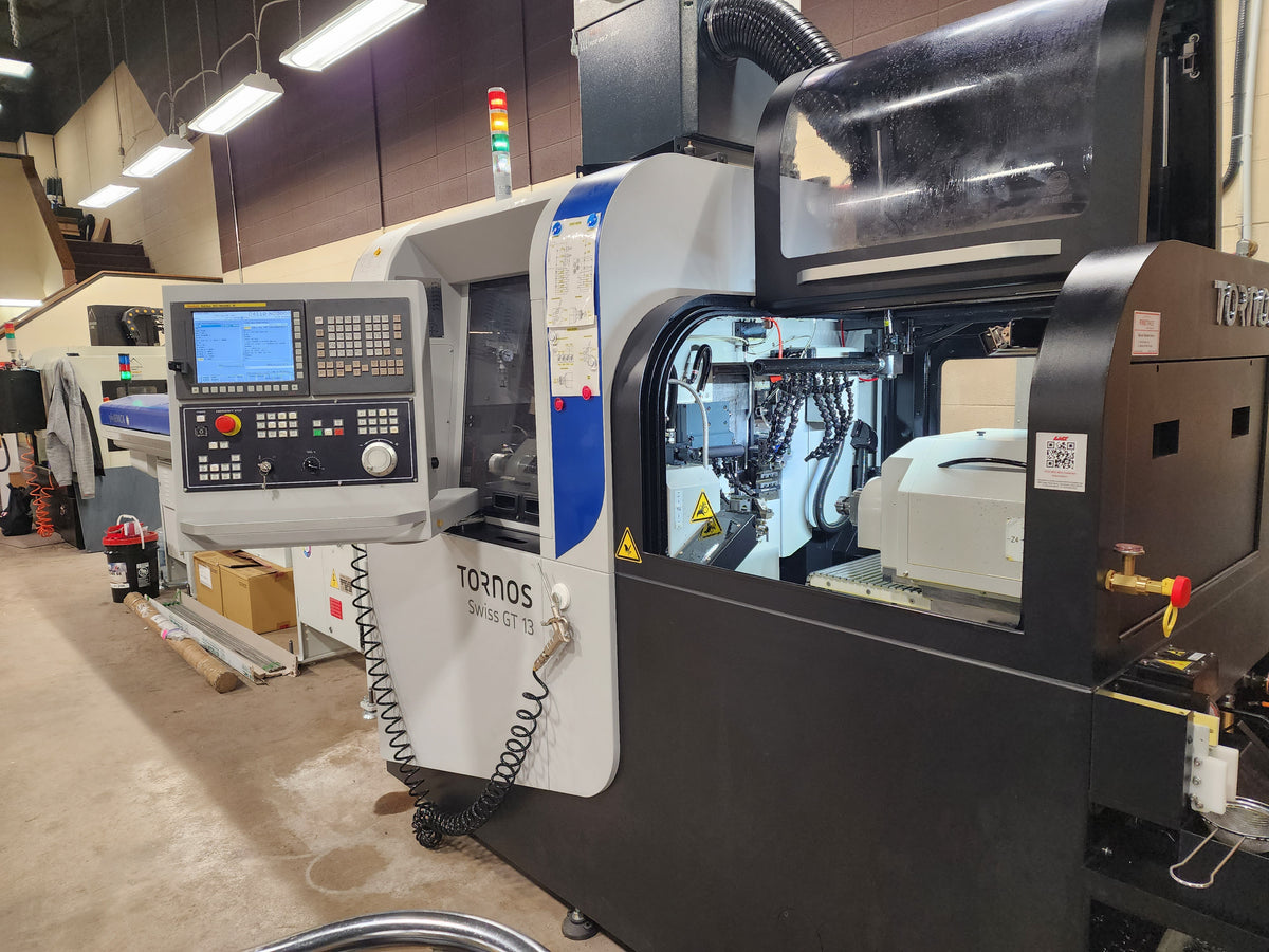 Tornos Swiss GT 13 CNC machine inside the Tribal Expression jewelry workshop in Calgary